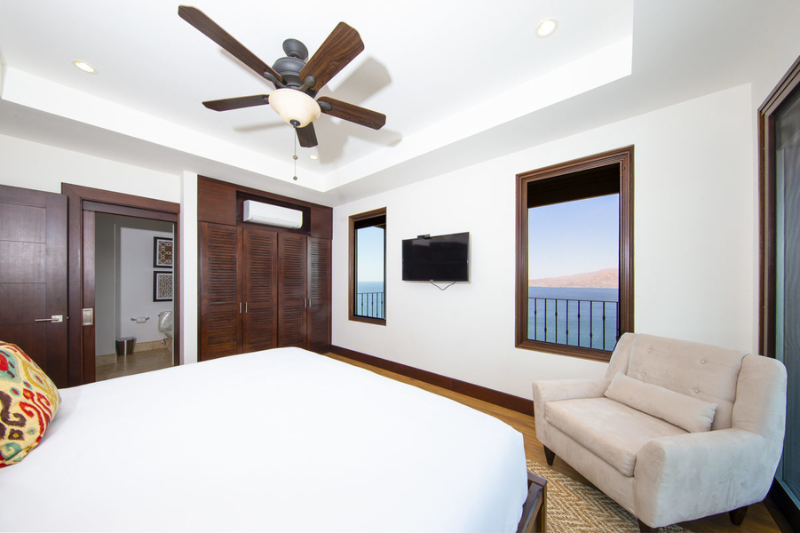 ocean view bedroom with en-suite bathroom