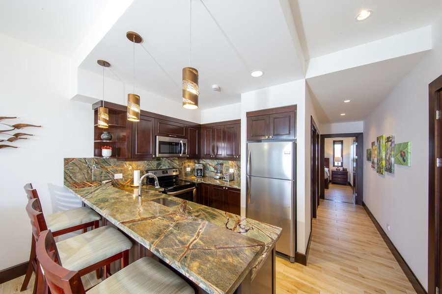 kitchen with stainless steel appliances and a breakfast bar